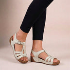 Cut-out detail T-strap flat wedge sandals – heel and sole detail