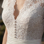 Women's lace bodice A-line midi wedding dress, back view
