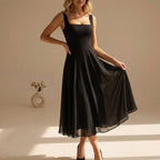 Women's square neck sleeveless midi dress in black – front view