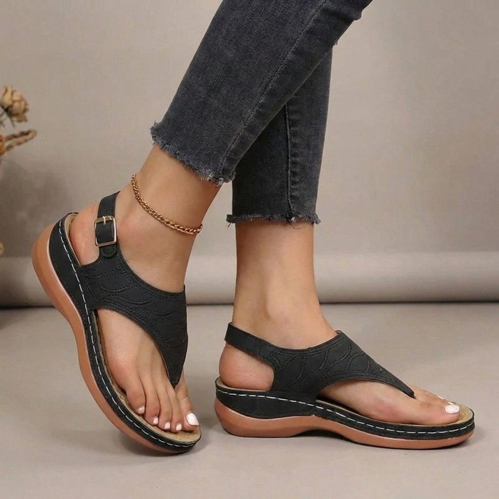 Women's orthopaedic thong sandals in black – arch support side view