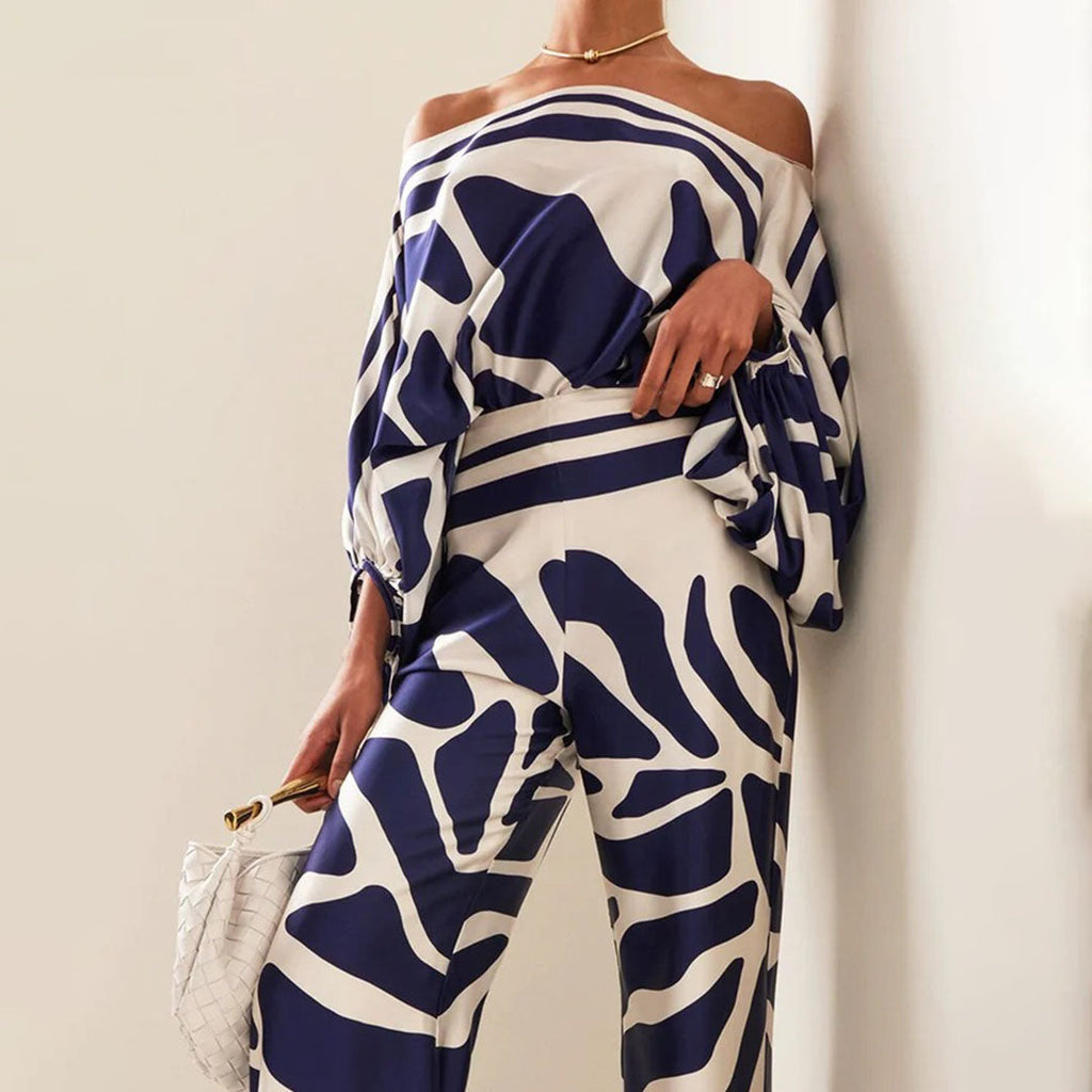Women's lantern sleeve off shoulder co-ord set in blue, side view
