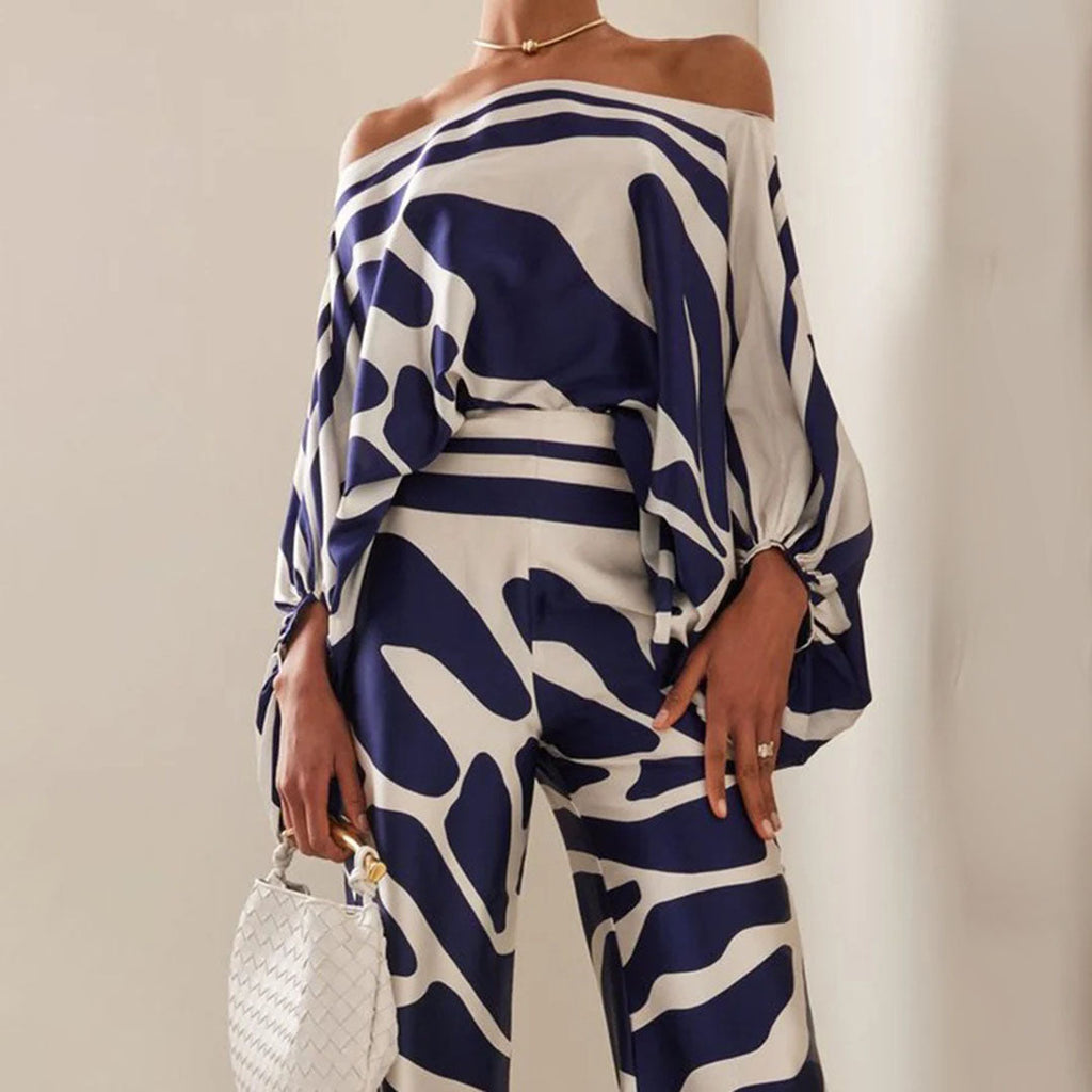 Women's lantern sleeve off shoulder co-ord set in blue, model view