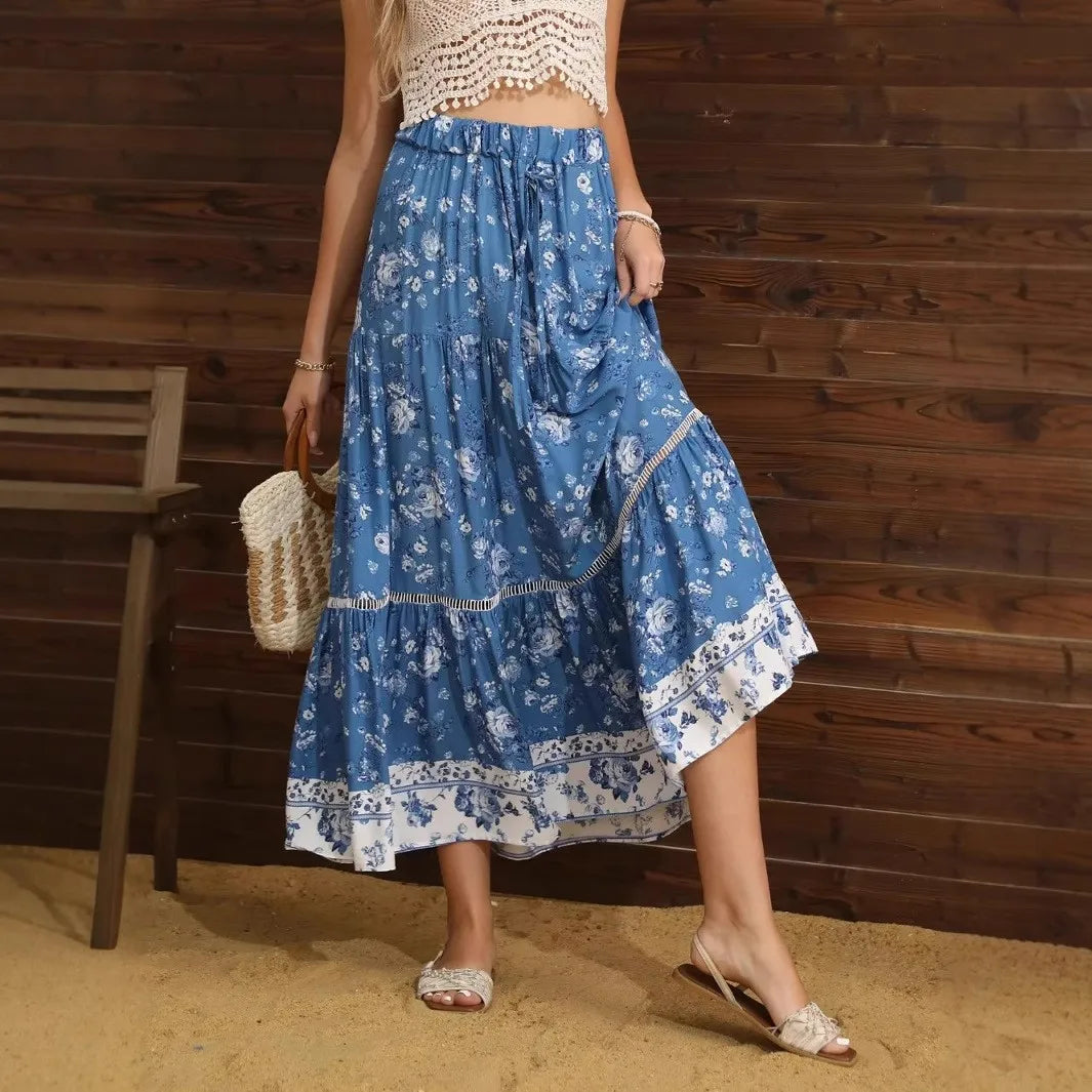 Women's Blue Floral Tiered Boho Maxi Skirt front view - Flowy A-Line Boho Skirt