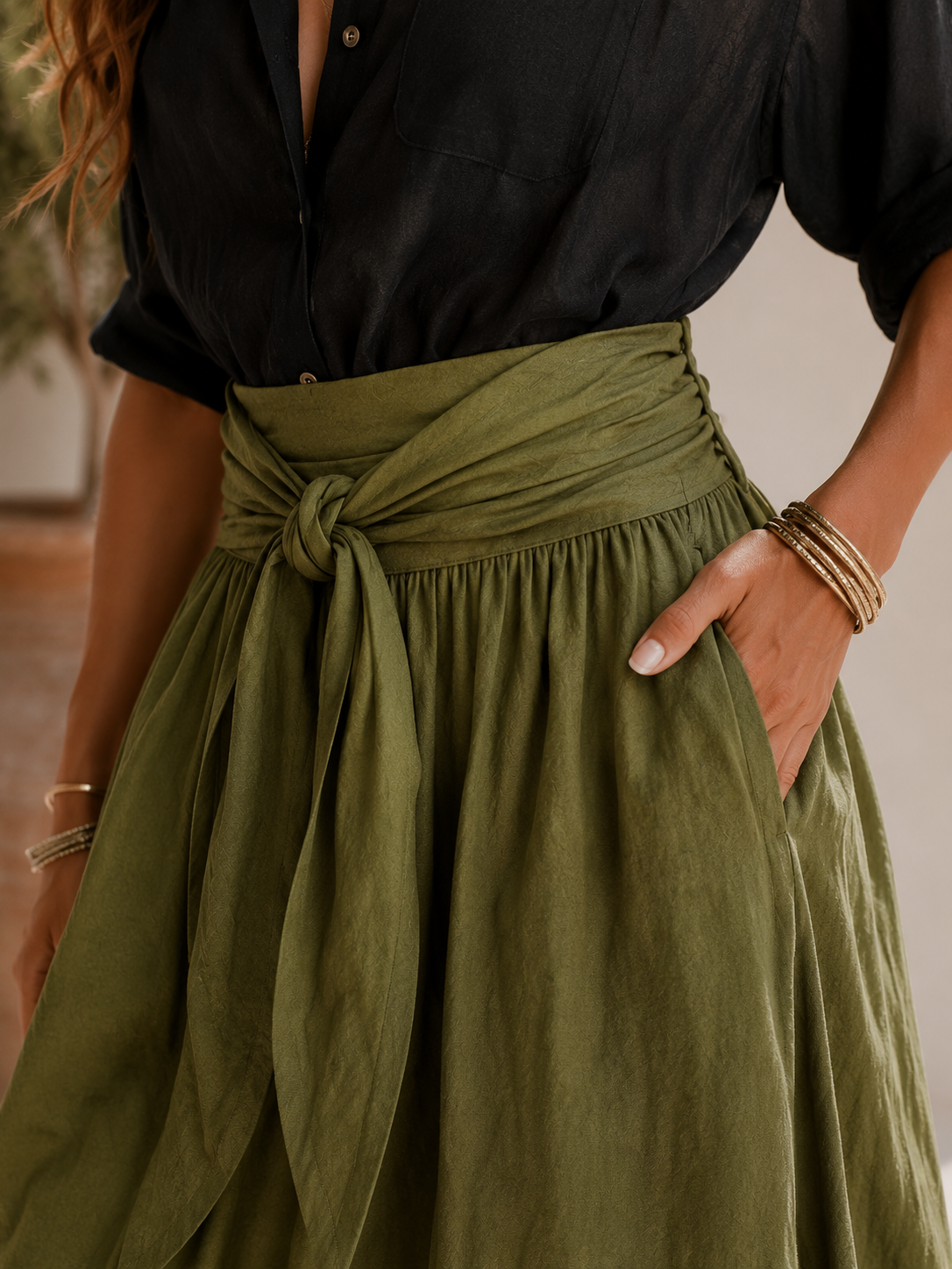 Flowing shirt and maxi skirt set, close-up of tie waist detail