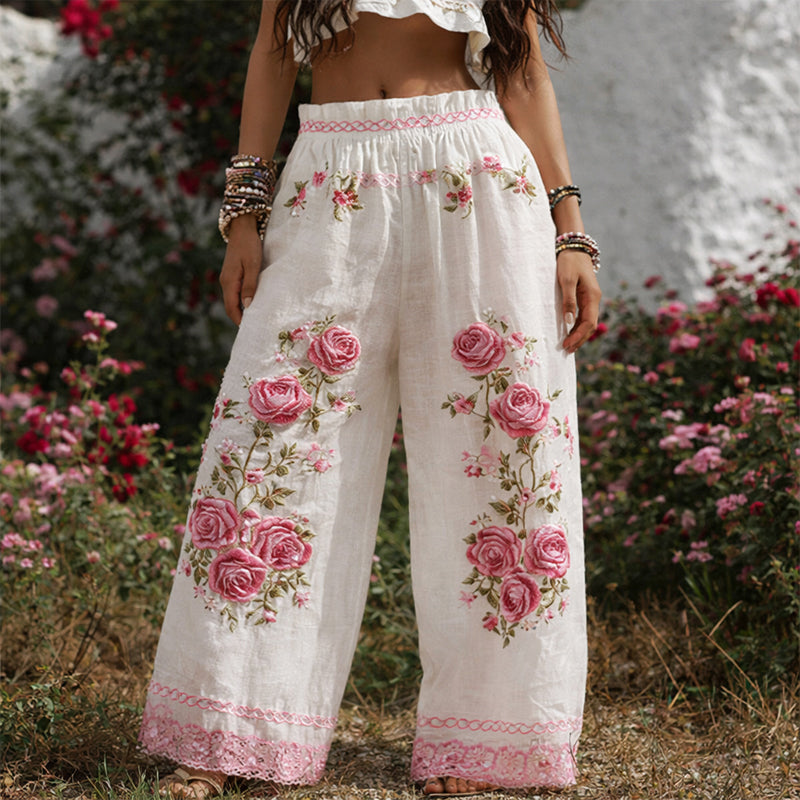 Floral embroidered wide leg pants in white, front view