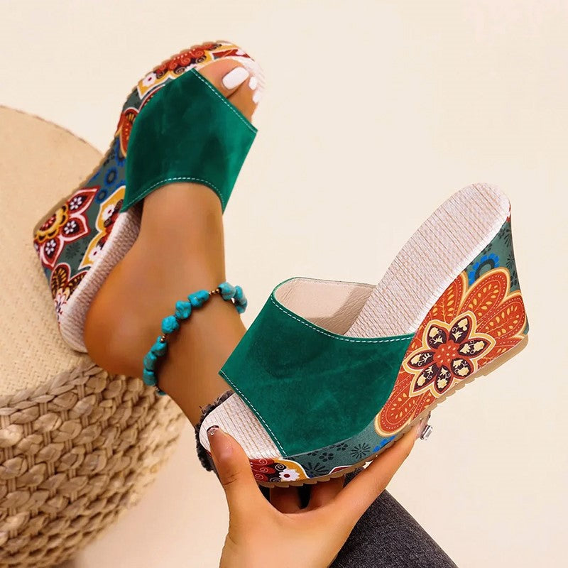 Velvet boho wedge sandals in black, worn view