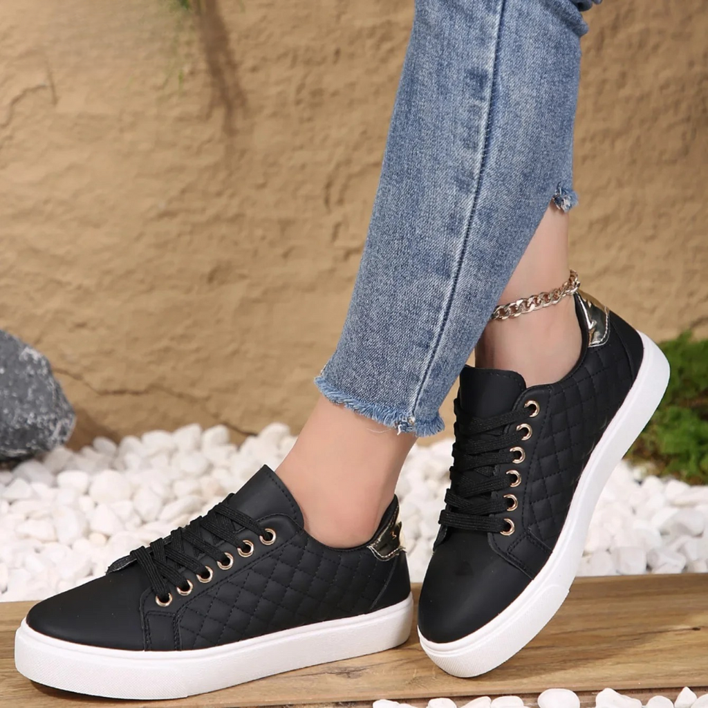 Comfort sneakers, side view showing shock-absorbing sole
