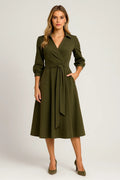 Women's long sleeve belted wrap midi dress in green – A-line front view