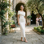 Women's mermaid evening gown with short sleeves and pleats, back view