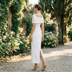 Women's mermaid evening gown with short sleeves and pleats, side view