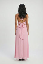 Pink halter maxi dress with backless design, back view