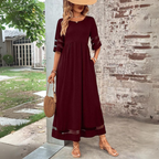Women's flattering empire waist maxi dress, three-quarter view