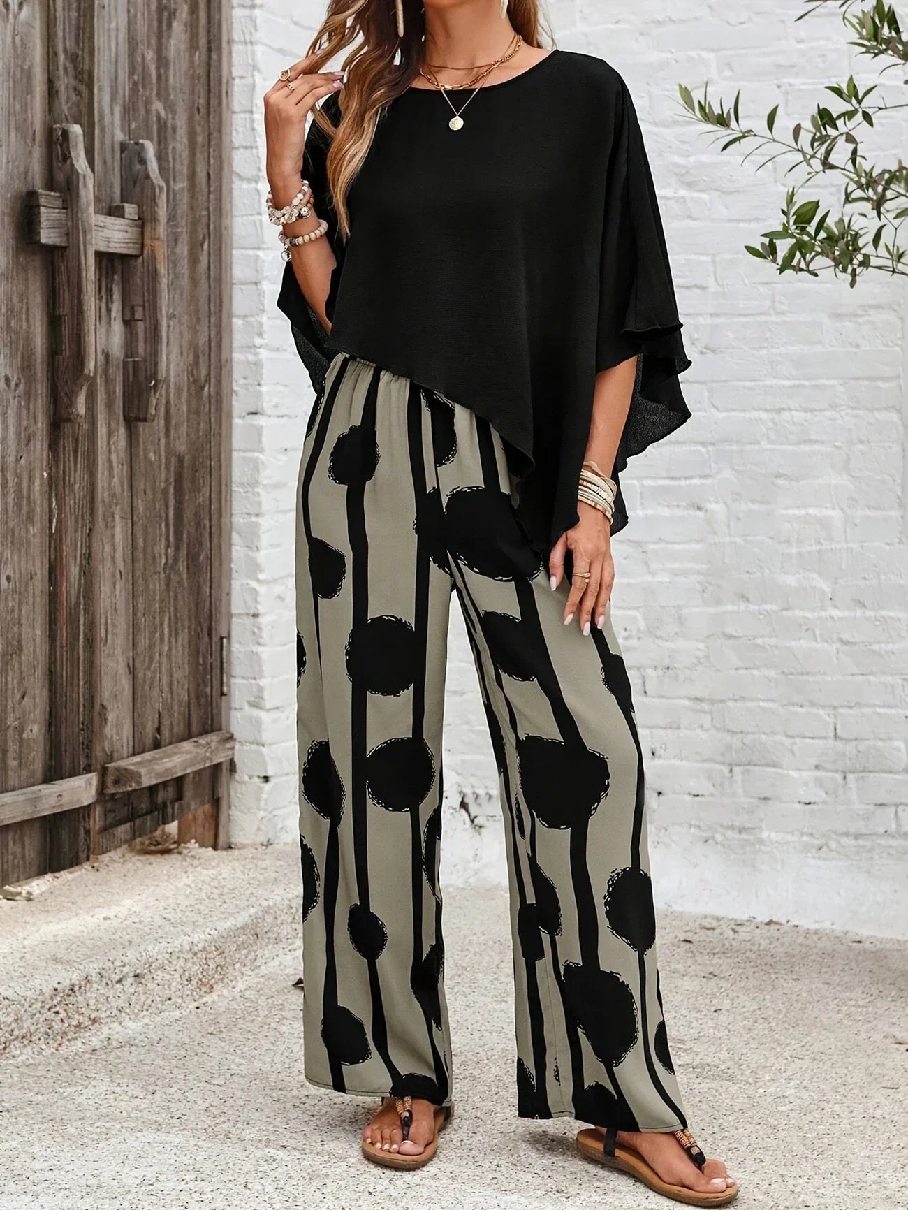 Asymmetric co-ord set with printed trousers, full length view