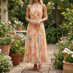 Women's floral halter neck maxi dress with open back, front view