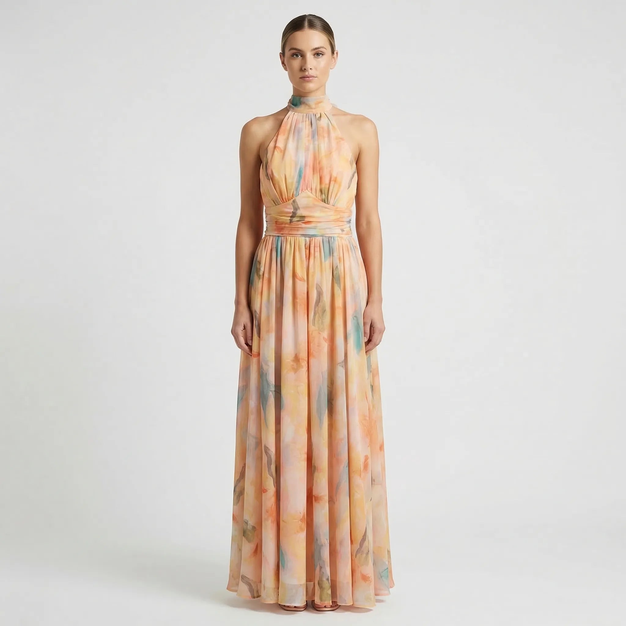 Women's floral halter neck maxi dress with open back, side profile view