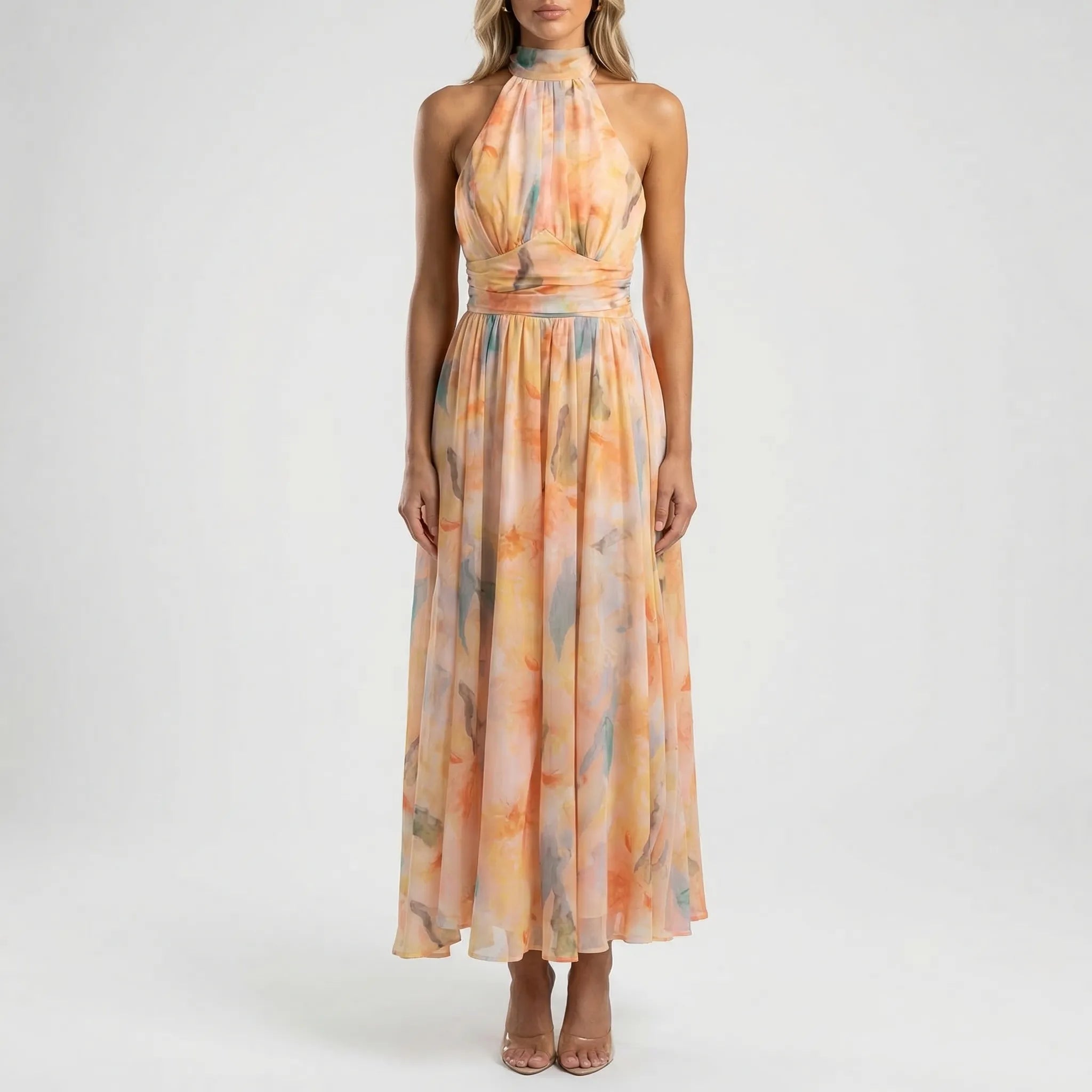 Women's watercolour floral maxi dress with halter neck, full length flowing silhouette