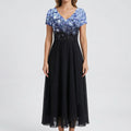 Close-up of floral bodice and contrast plain skirt detail