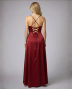 Women's flowing silk maxi dress with braided back, styled occasion look