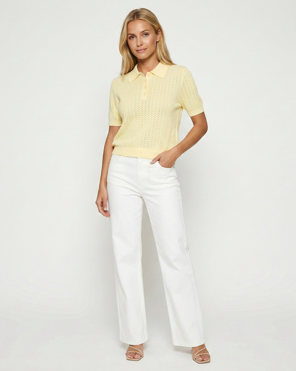 Women's polo collar knit top in yellow – short sleeve relaxed fit front view