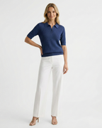 Women's polo collar knit top in navy – short sleeve relaxed fit front view