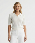 Women's polo collar knit top in white – short sleeve relaxed fit front view
