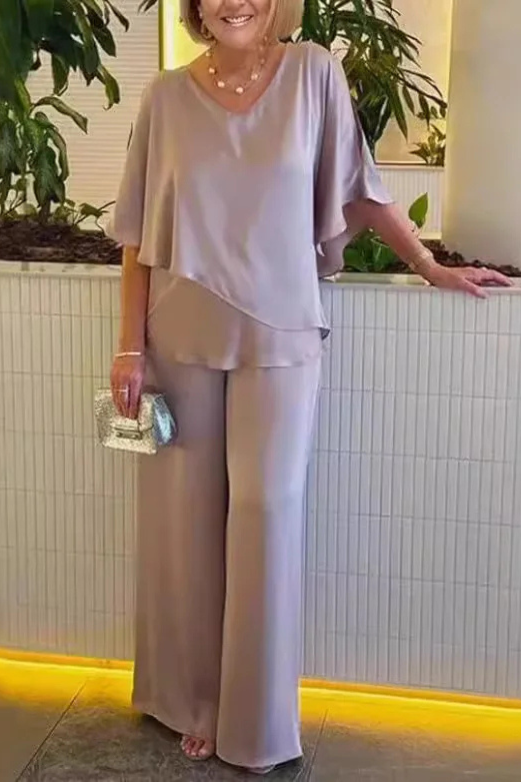 Women's batwing sleeve top and wide leg trousers two piece set, full length view