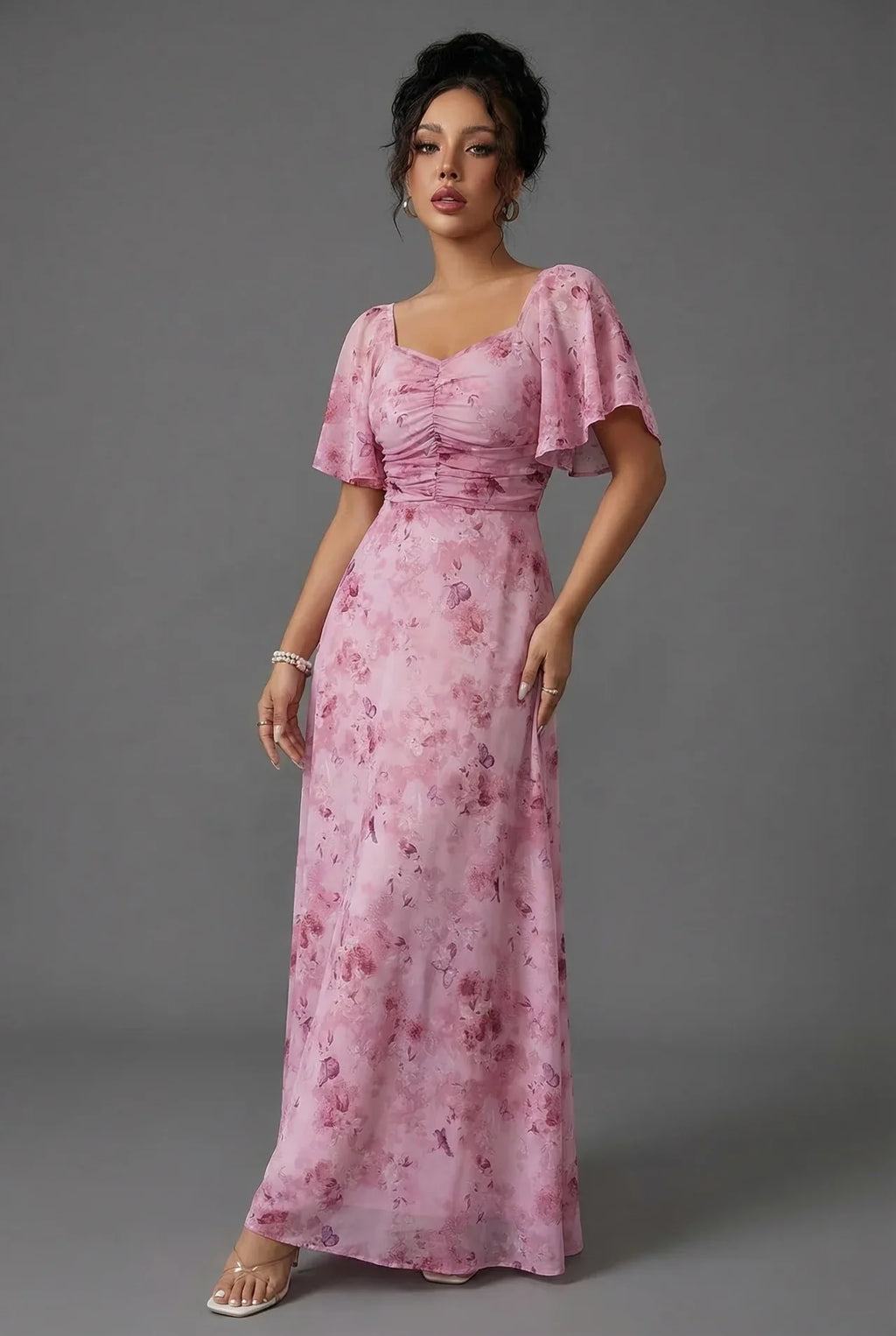 Women's floral maxi wedding guest dress with flutter sleeves and sweetheart neckline, front view