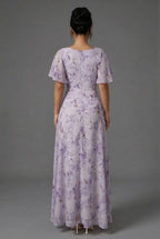 Flutter sleeve floral maxi dress styled for weddings