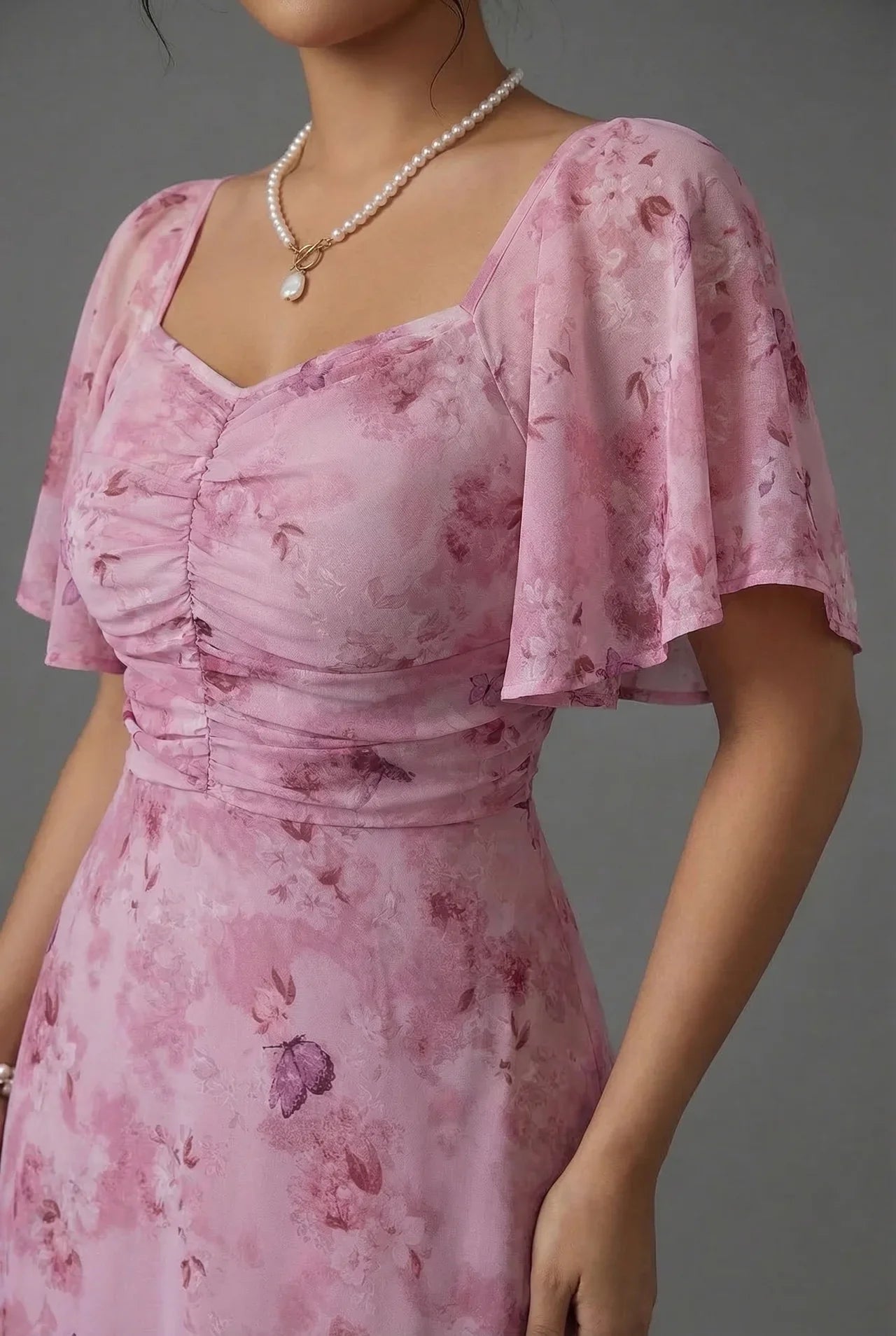 Floral maxi wedding guest dress back view