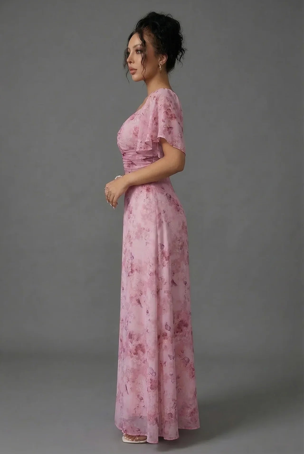 Floral maxi dress with ruched bodice and cinched waist, side view
