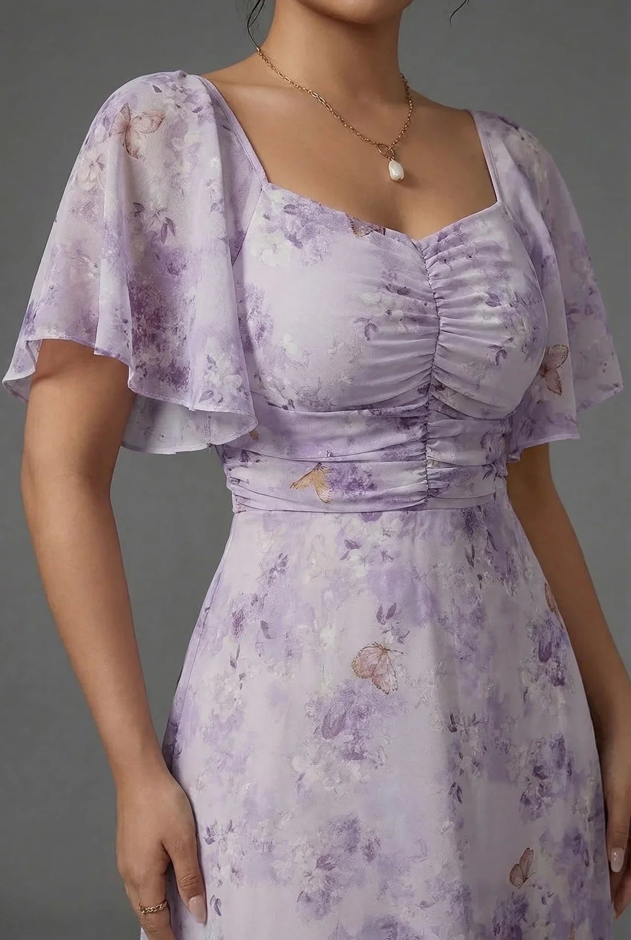 Women's chiffon floral maxi dress close-up print detail