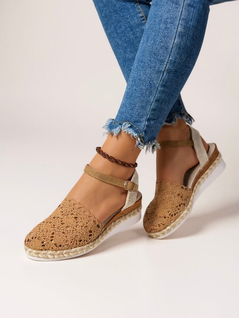 Women's summer wedge sandals with ankle strap and boho design, lifestyle shot