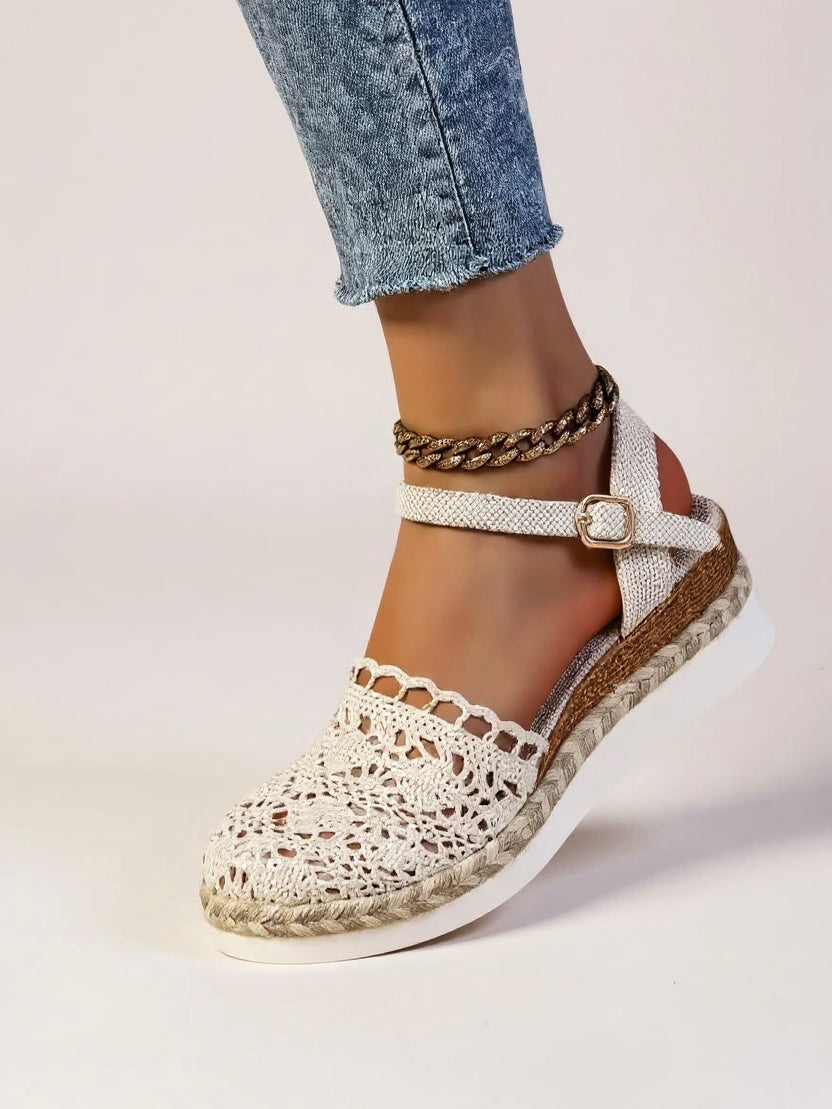 Women's ankle strap wedge espadrille sandals, close-up of sole and strap