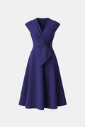 Navy midi dress three-quarter view occasion style