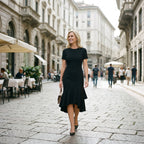 High neck fitted midi dress with asymmetric ruffle hem, side view