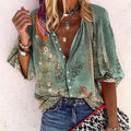 Women's floral print V-neck blouse front view green three-quarter sleeve