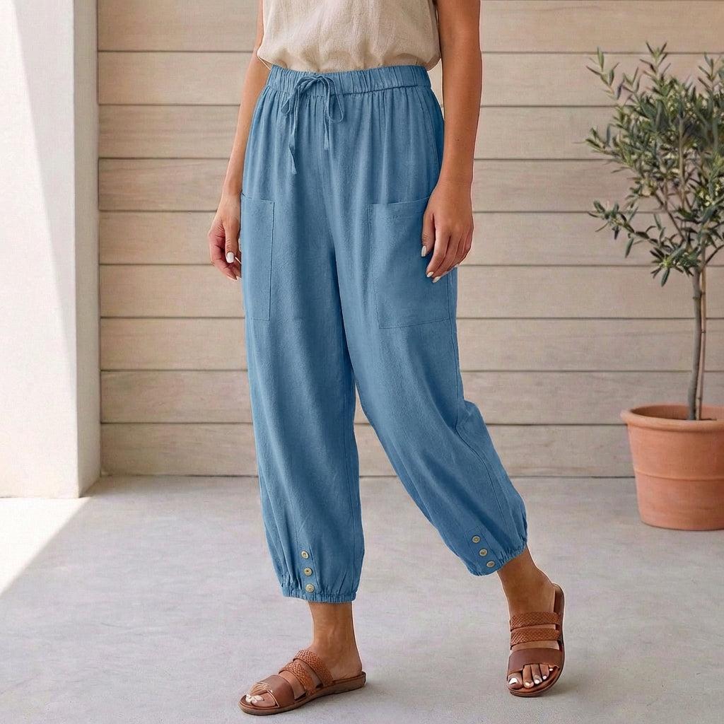 Women's high-waisted linen trousers styled for smart-casual