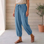 Women's high-waisted linen trousers styled for smart-casual