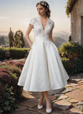 Women's lace V-neck midi wedding dress in white – flared A-line skirt front view