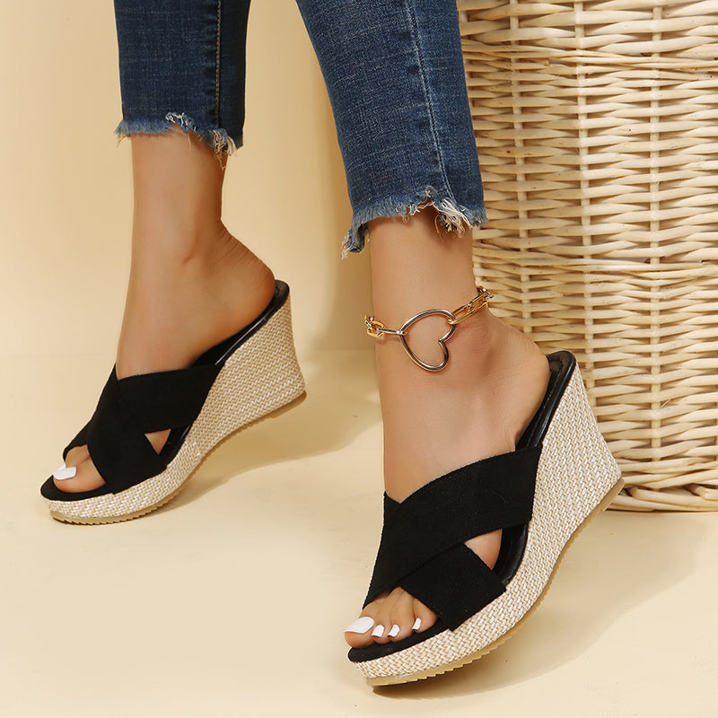 Holiday wedge sandals with crossover straps, three-quarter view