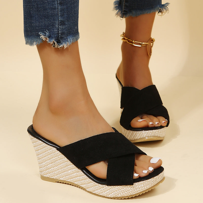 Cross strap wedge sandals in black colourway, front view