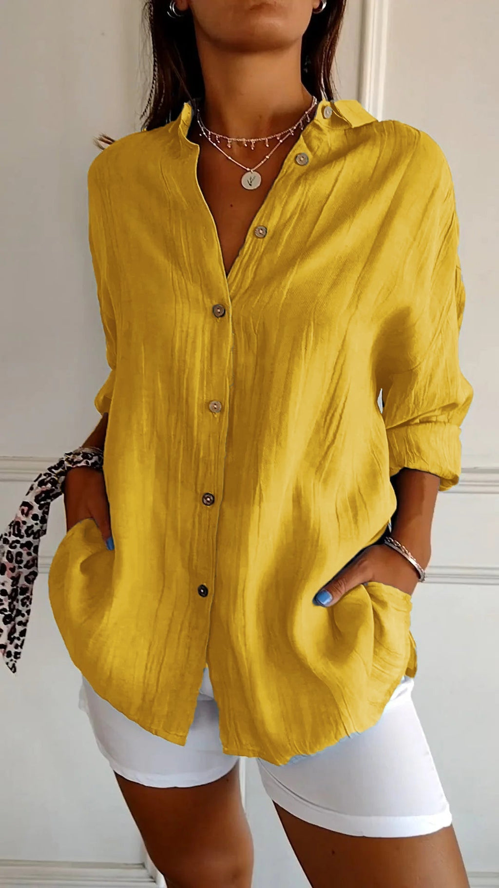 Blue button-down shirt three-quarter view