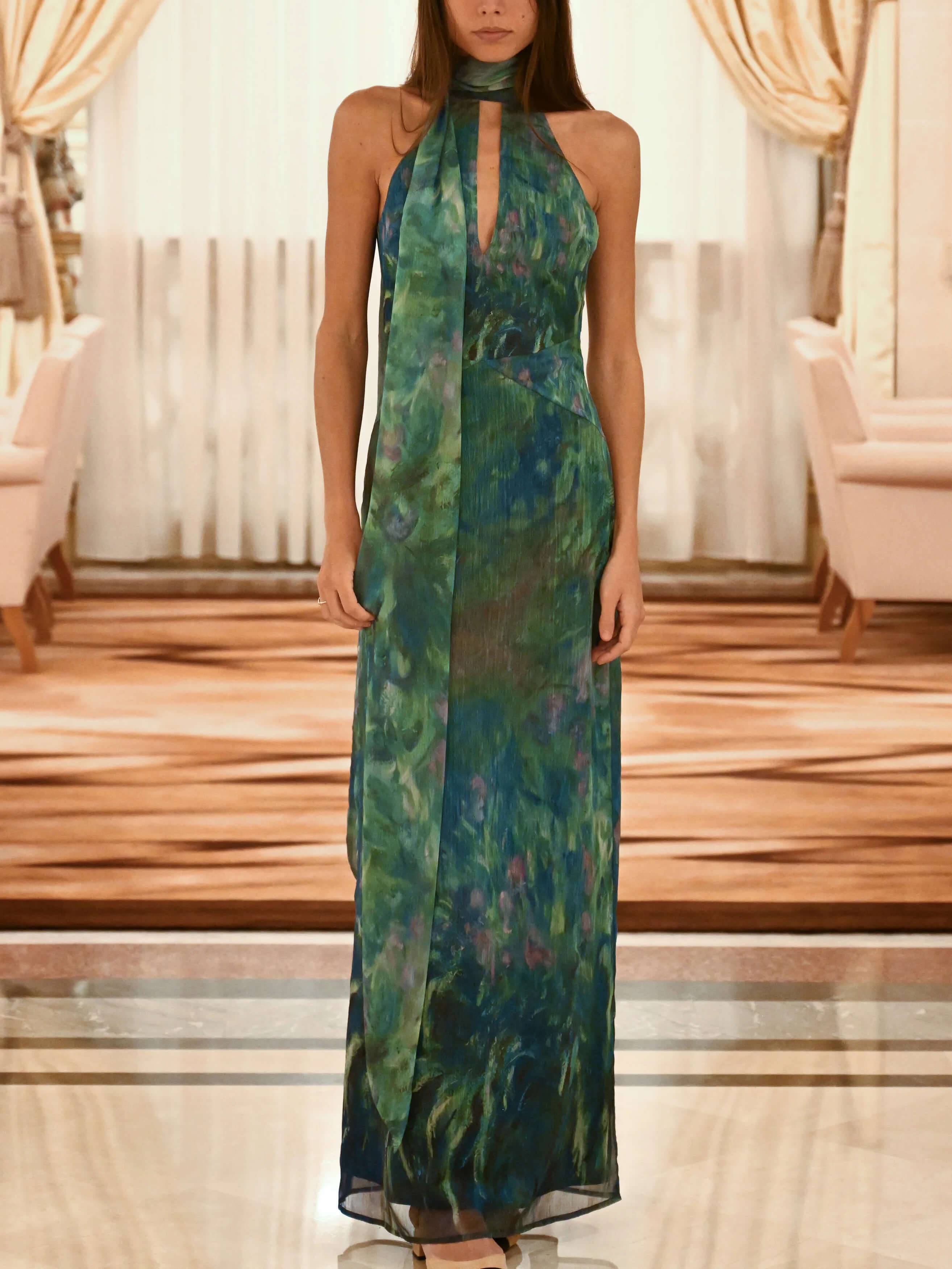 Women's painterly print formal maxi dress, close-up of neckline and drape