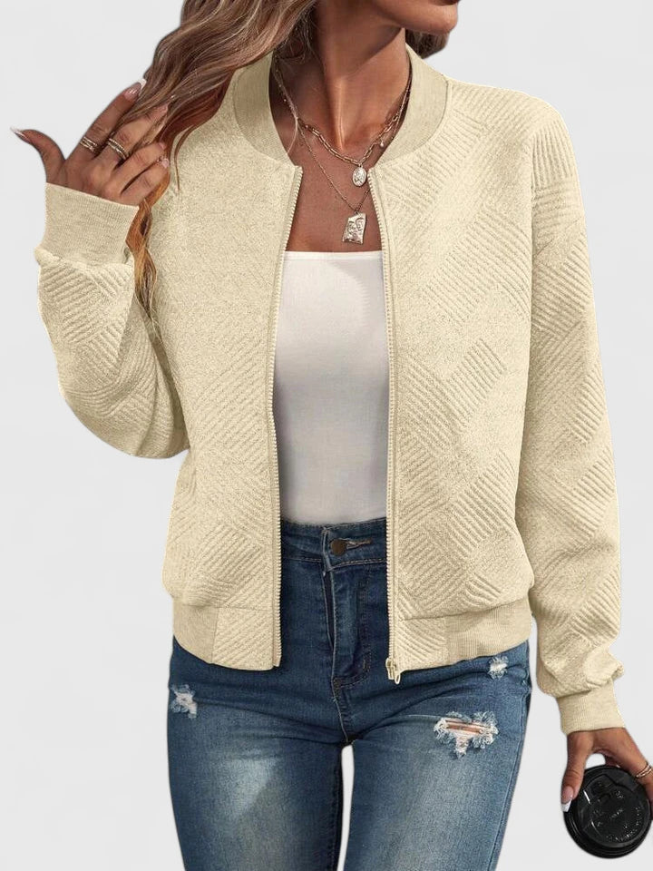 Beige textured geometric bomber jacket with ribbed collar, front view worn open