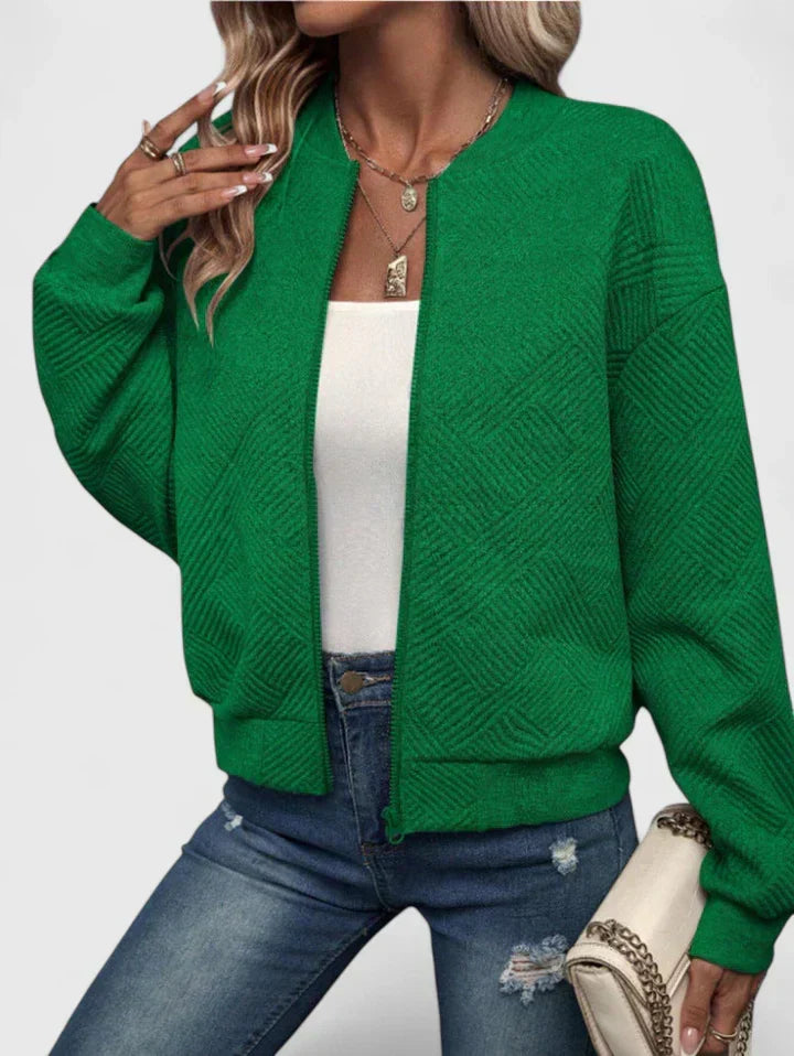 Green textured geometric bomber jacket with ribbed collar, front view worn open