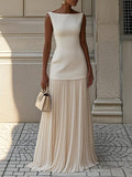 Sleeveless maxi dress with flowing pleated skirt in beige | Alba Muse
