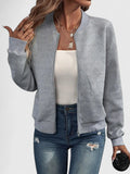 Grey textured geometric bomber jacket with ribbed collar, front view worn open