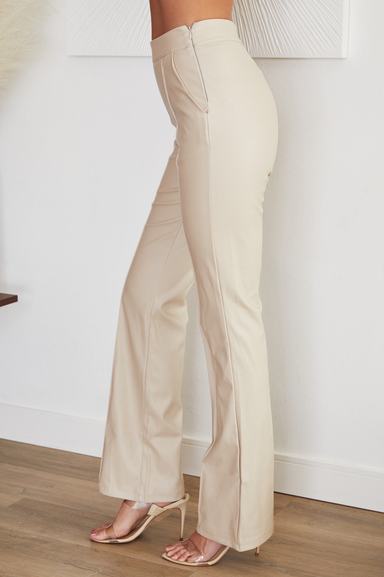 Women's faux leather straight leg trousers, back view