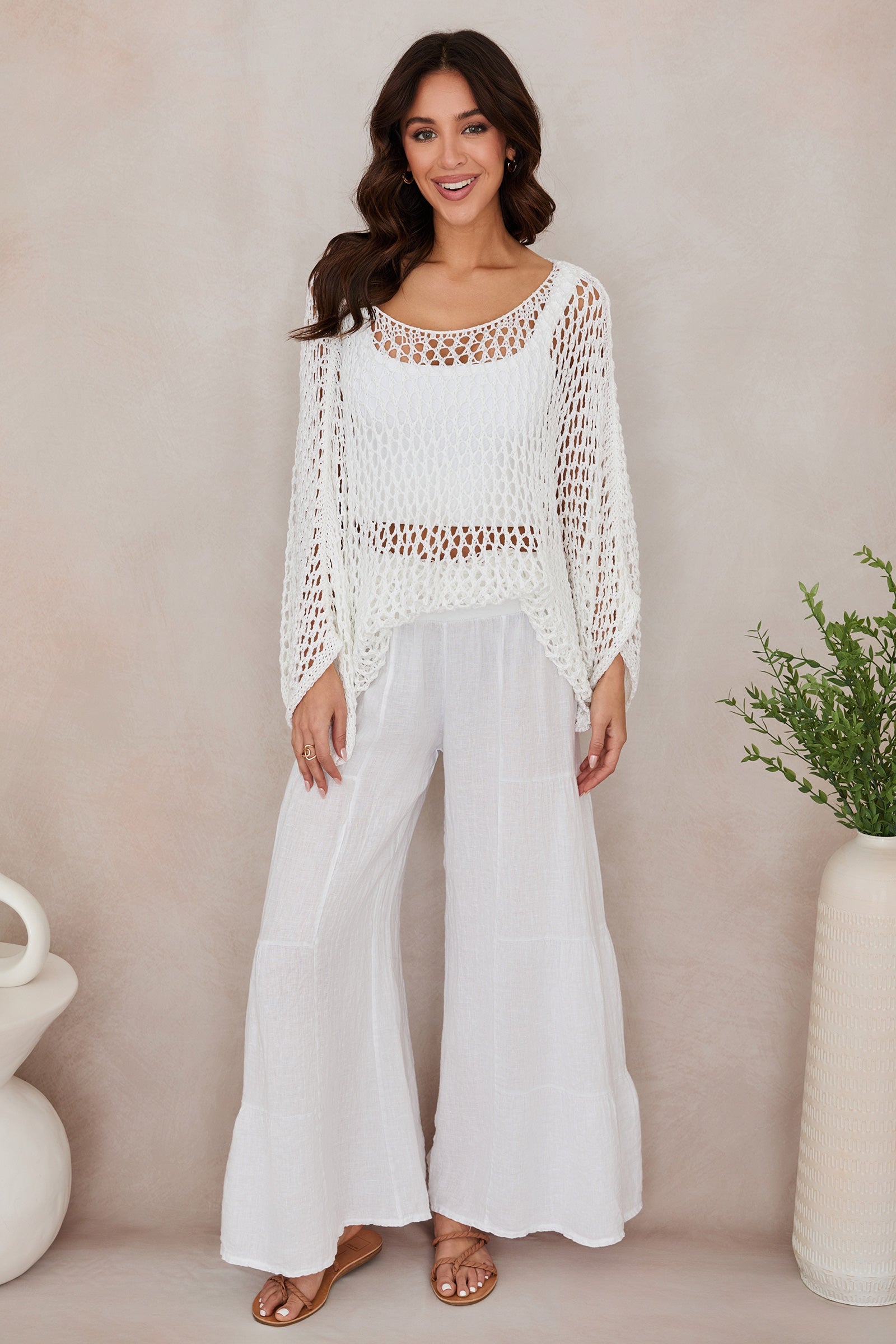 Women's wide leg tiered linen palazzo trousers, styled outfit