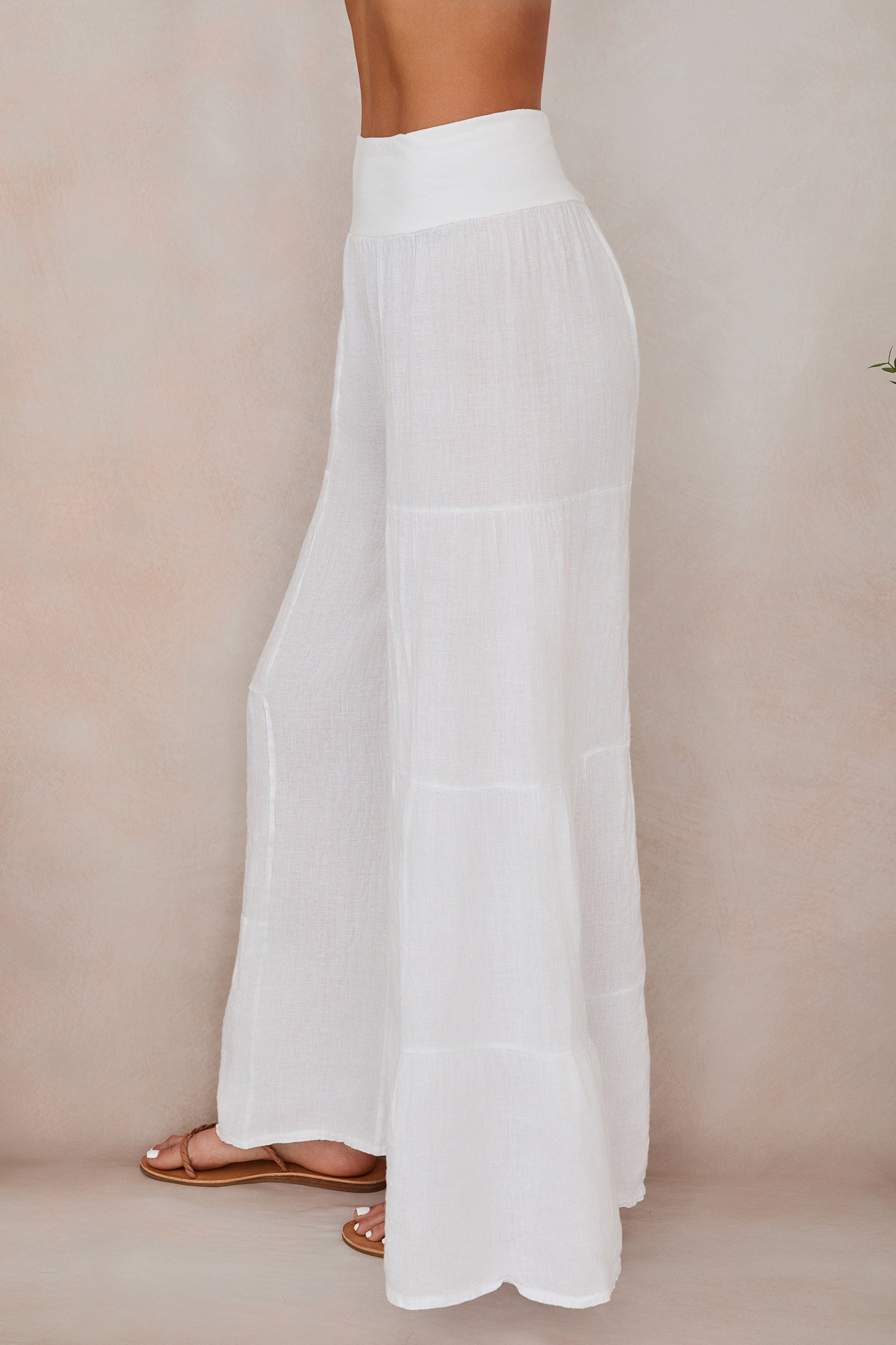 Women's wide leg tiered linen trousers, elasticated waistband detail